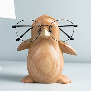 Wood-shaped animal eyeglass holders can be customized to store