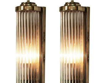 Par de apliques de pared antiguos estilo rascacielos, estilo art déco, de latón y cristal, con varilla.