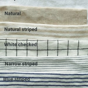 May include: A close-up of eight fabric swatches in different colors and patterns. The swatches are arranged vertically, with the top swatch being off-white and the bottom swatch being gray checked. The swatches are labeled with their names: Off white, Milky white, Natural, Natural striped, White checked, Narrow striped, Blue striped, Gray striped, and Gray checked.