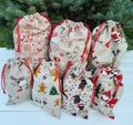 Linen Christmas Gift Bags – Mini to XL Sizes | Festive Reindeer, Santa & Dog Prints product logo