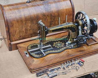 Beautiful Stoewer Antique hand crank Sewing machine with accessories