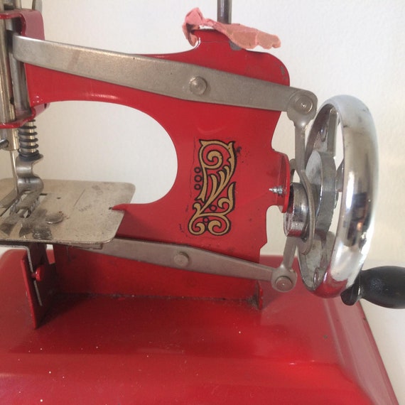 Red Vintage Little Betty Toy, Child's Hand Crank Chain Stitch
