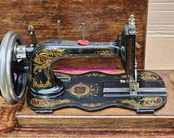 The Climax (Kay & Co.) Fiddle base Hand crank Sewing Machine with case