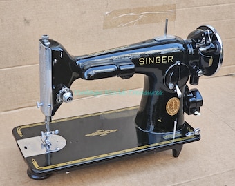 Preciosa máquina de coser vintage eléctrica Singer 201-2 con motor en maceta