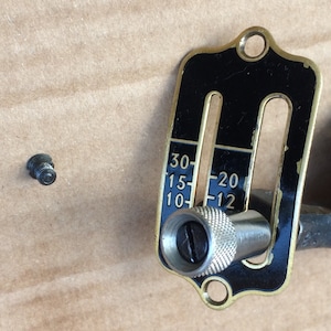 Singer 99 sewing machine stitch length regulator
