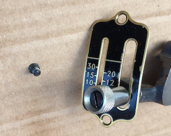 Singer 99 sewing machine stitch length regulator