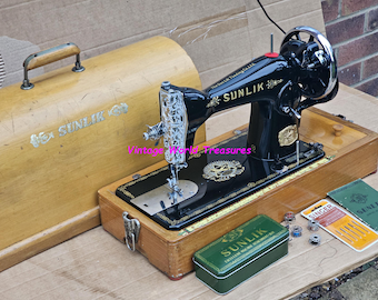 Sunlik Vintage sewing machine with bentwood case