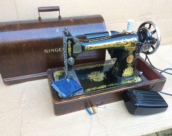 Singer 127K  electric sewing machine with sphinx decals