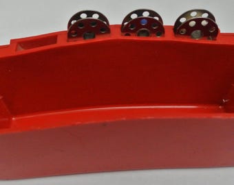 Red Singer featheweight sewing machine attachments case with 3 bobbins