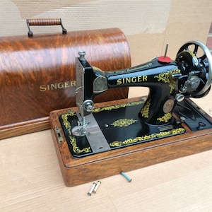 Painting an old mock croc case for a Singer Sewing Machine 