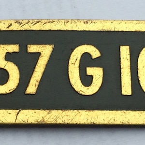 Singer 457G105 Sewing Machine Brass Badge only