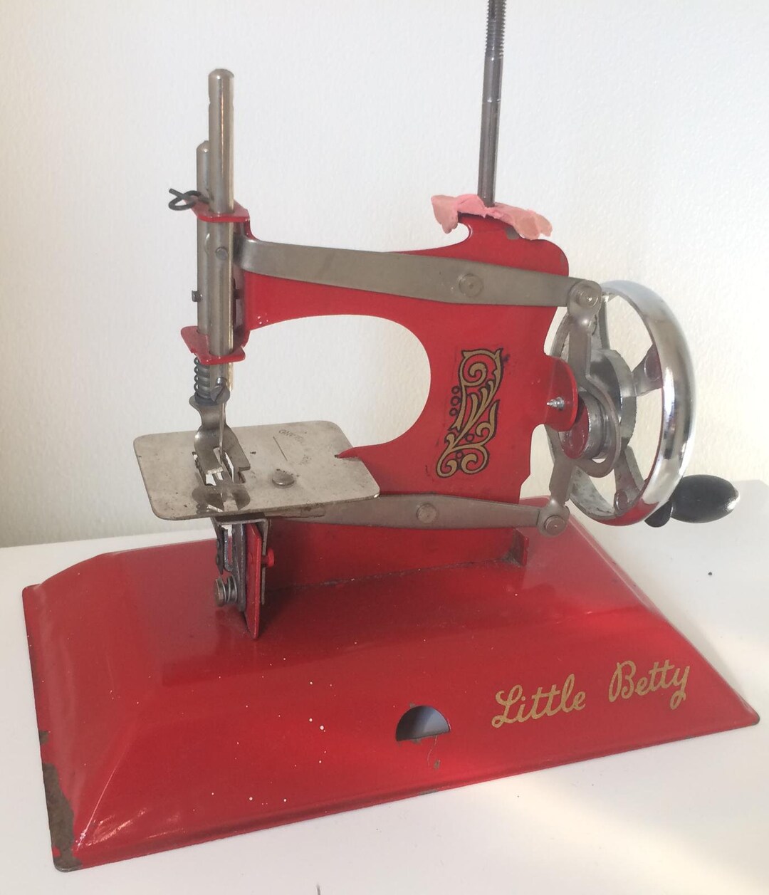 Red Vintage Little Betty Toy, Child's Hand Crank Chain Stitch