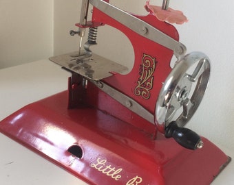 Red Vintage Little Betty Toy, Child's Hand Crank Chain Stitch