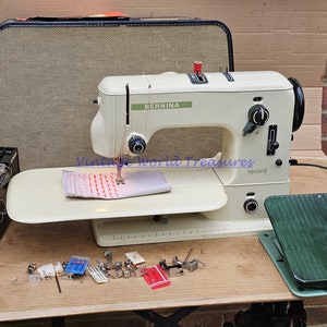 Bernina 530-2 Record automatic Zig Zag Electric Free-Arm Sewing Machine with accessories.