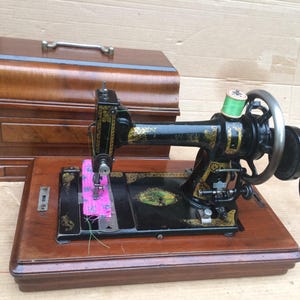 White Peerless Antique sewing machine