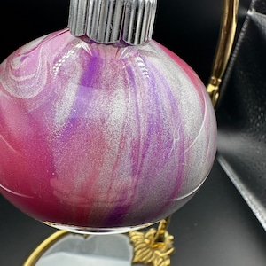 Metallic red, purple, silver ornament