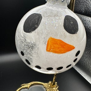 Snowmen ornament clear