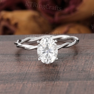 Moissanite Infinity-verlovingsring, kleurloze Moissanite Solitaire-ring, ovale gedraaide ring, 14k witgoud, minimalistische ring, cadeau voor vriendin