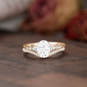 Dainty Moissanite Engagement Ring Set, 1.5ct Oval Moissanite Ring, Vintage Rose Gold Cluster Ring, Art Deco Curved Wedding band, Bridal set image 2