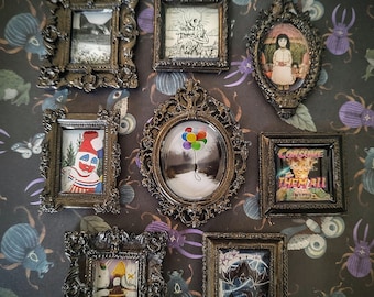 May include: Nine ornate gold picture frames with various images inside. The frames are arranged in a grid pattern on a dark background with a repeating pattern of insects and eyes. The images include a clown, a girl, a forest scene, a skeleton, a hot air balloon, and a poster that says "Consume Them All".