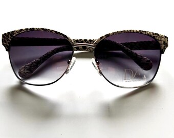 Diane Von Furstenberg Zianna cat-eye sunglasses with a scale print and metal frame
