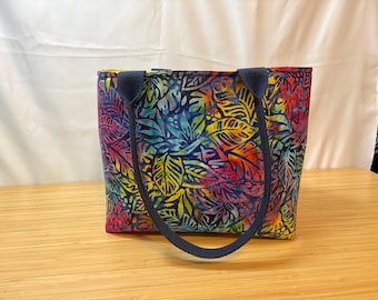 Beautiful small tote bag/purse. Rainbow Batik Cotton. Water bottle holder, interior zipper pocket, slip pockets. Structured Bag.