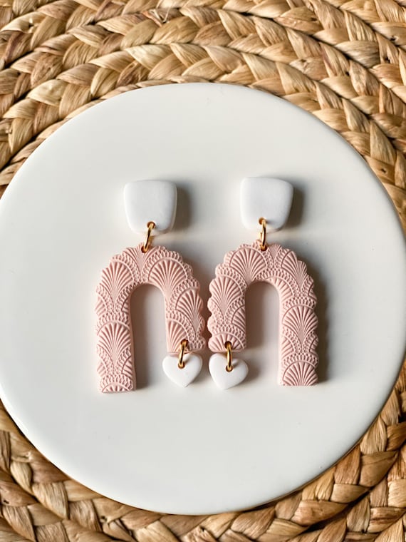 Arch clay earrings deals