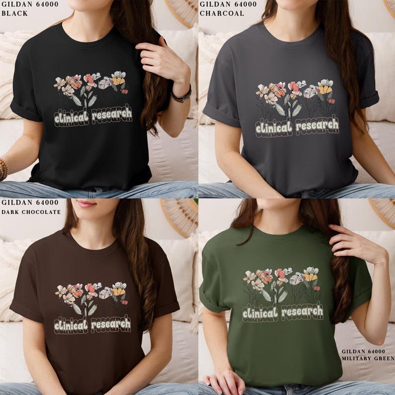 May include: Four t-shirts in different colors with a floral design and the text "clinical research". The colors are black, charcoal, brown, and green.
