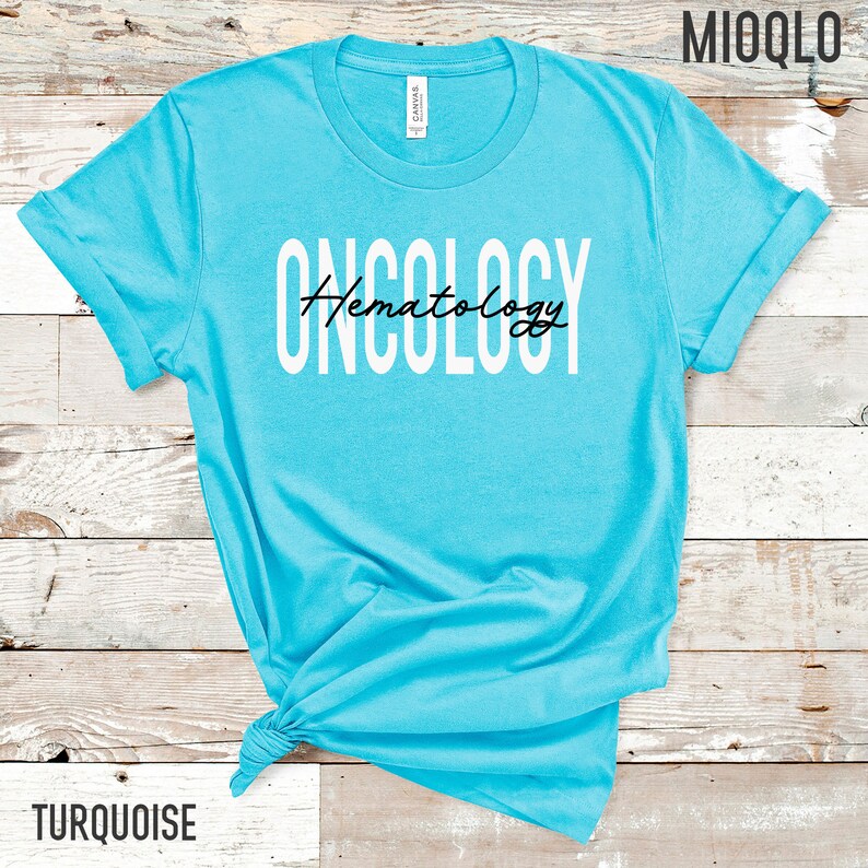 May include: Turquoise blue t-shirt with the text "ONCOLOGY Hematology" in white and black lettering.