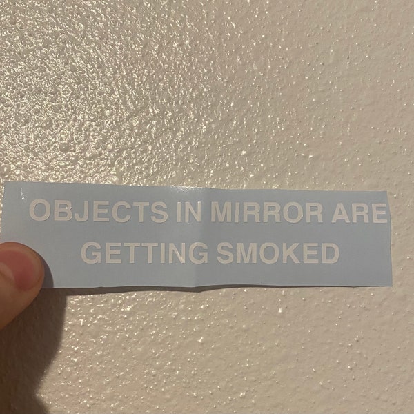 Les objets dans les miroirs sont fumés Sticker