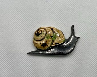 Azulejo de cerámica con forma de caracol