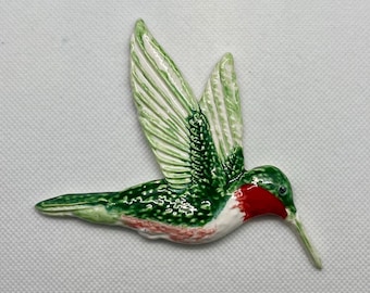 Colibrí de cerámica colorido