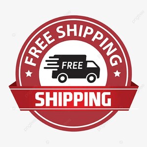 May include: Red and white circular sticker with the text "FREE SHIPPING" and a black delivery truck with the word "FREE" on it. A red ribbon with the text "SHIPPING" is attached to the bottom of the sticker.