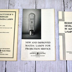 May include: Three vintage General Electric pamphlets about Mazda lamps. The pamphlets are titled "Manufacturer's Schedules Large Mazda Lamps", "New and Improved Mazda Lamps for Projection Service", and "Recent Developments in Mazda Lamps".