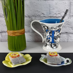 Adorables platos / soportes de bolsitas de té de cerámica