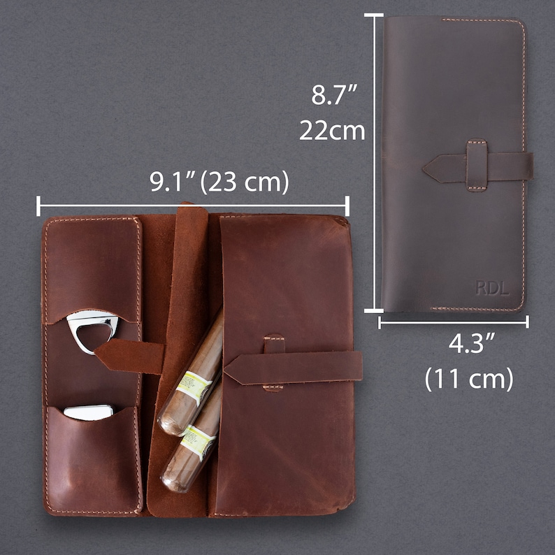 May include: A brown leather cigar case with a strap closure, featuring internal pockets for a metal cutter and lighter, and space for two cigars. The case measures 9.1 inches by 8.7 inches when open, and 8.7 inches by 4.3 inches when closed with RDL embossed.