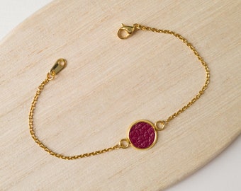 Minimalist gold or silver stainless steel bracelet with raspberry leather inlay medallion