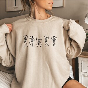 Urban outfitters skeleton hoodie hotsell