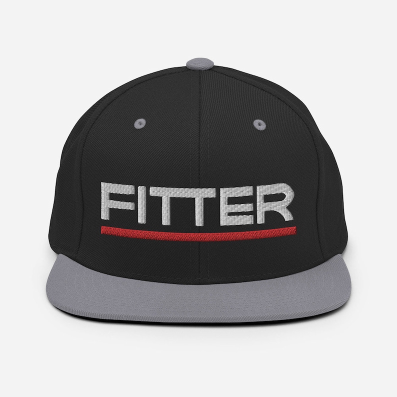 May include: A black and gray fitted baseball cap with a red stripe and the word "FITTER" embroidered in white.