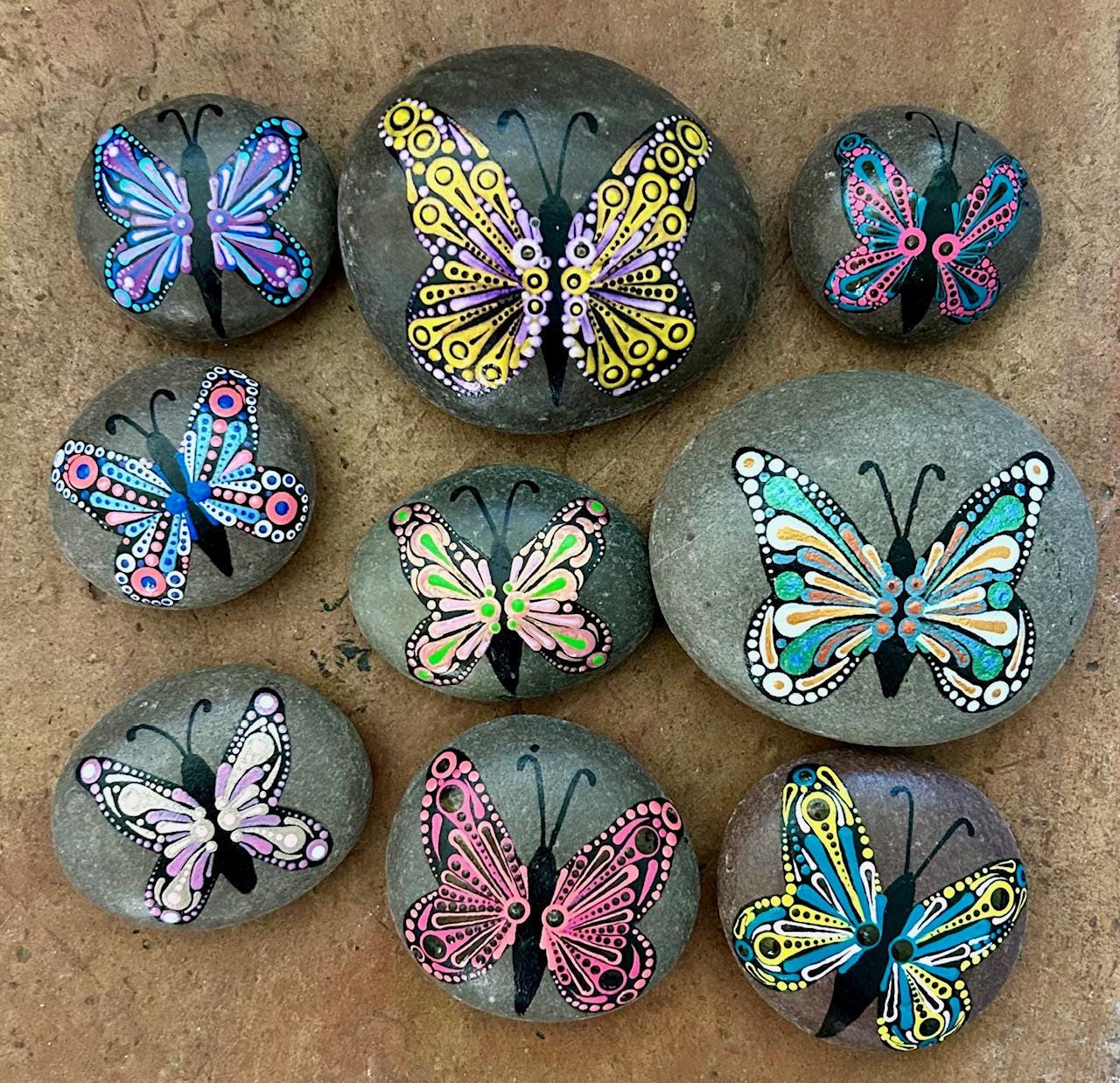 Painted butterfly rocks
