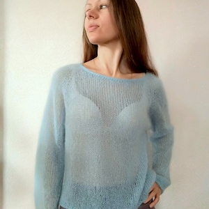 Blue fine mohair jumper for women. Tender and soft jumper.