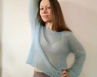 Blue fine mohair jumper for women. Tender and soft jumper.