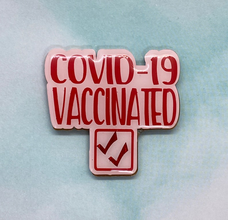 COVID-19 Vaccinated Badge Reel