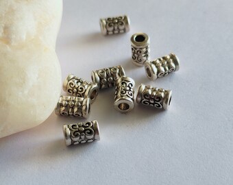 Set of 10 Tibetan interlayer beads in the shape of a metal tube of ancient silver color,