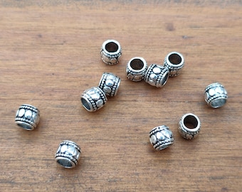 Antique silver-colored barrel-shaped metal spacer beads, set of 8.