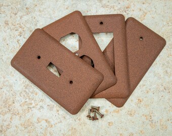 Western Rust powder coated Toggle, Rocker, Duplex, and Blank round corner metal switch plates