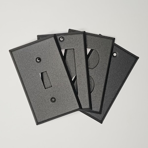 Charcoal Grey Texture powder coated Toggle, Rocker, Duplex, and Blank metal switch plates-available in standard, mid-size, and over-size
