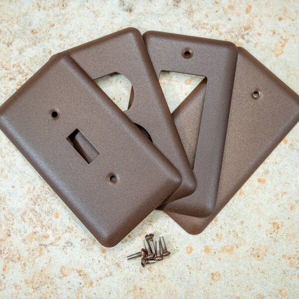 Walnut Texture powder coated Toggle, Rocker, Duplex, and Blank round corner metal switch plates. Dark brown outlet cover