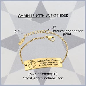 May include: Gold chain bracelet with an extender, measuring 6.5 inches long. The bracelet has a personalized bar with the text "Natalie Peers Alzheimers ICE:123.456.7890" and a medical star symbol.