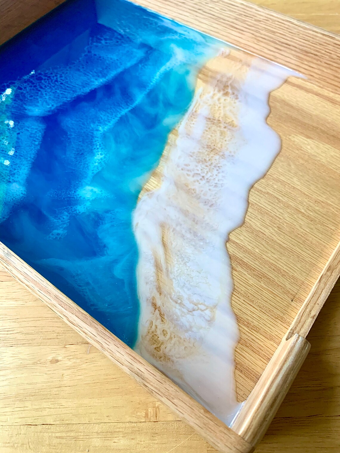 A huge tidal wave is called image